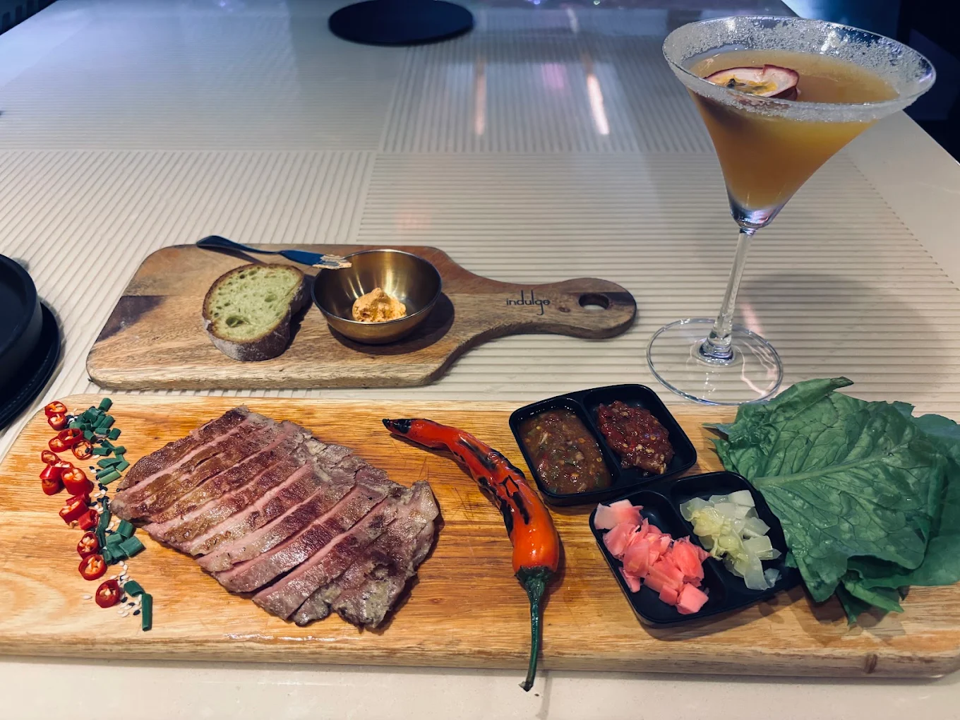 Food, drinks, and social dining at Indulge, offering a welcoming setting for meals, cocktails, and group gatherings.