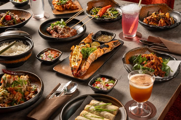 Thai-inspired dishes at Indulge Fusion Food & Cocktail Bar featuring flavorful Asian ingredients and colorful presentation.