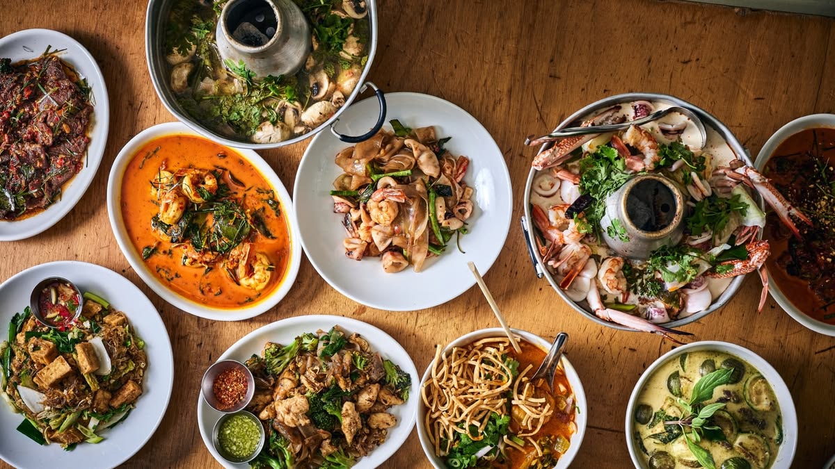 Thai cuisine featuring a variety of traditional dishes beyond Pad Thai, including curry, soup, vegetables, and rice.