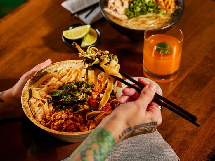 Thai-inspired noodles served at Indulge Fusion Food & Cocktail Bar with fresh vegetables and flavorful Asian-style ingredients.