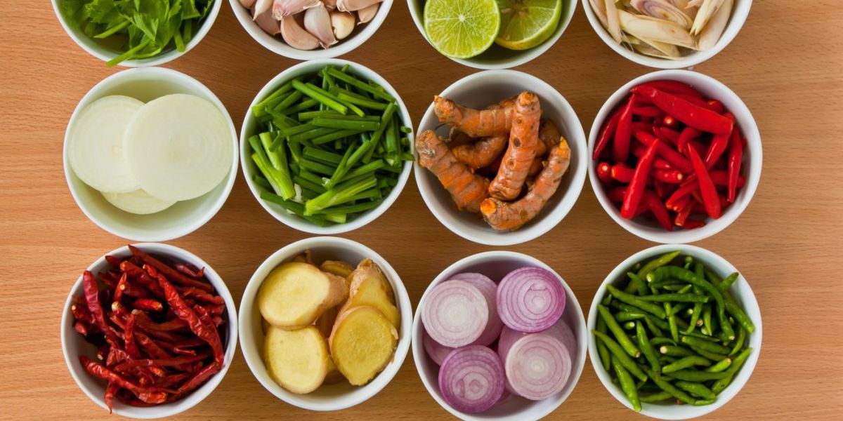 Thai food ingredients including herbs, spices, aromatics, and fresh produce