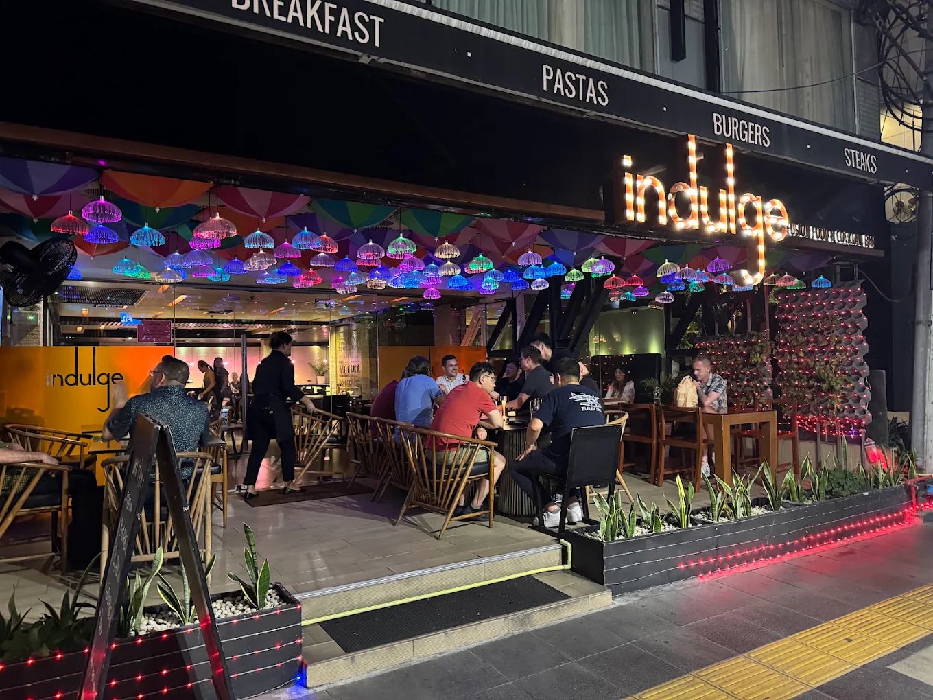 Regional Thai food and sharing dining culture in Bangkok.