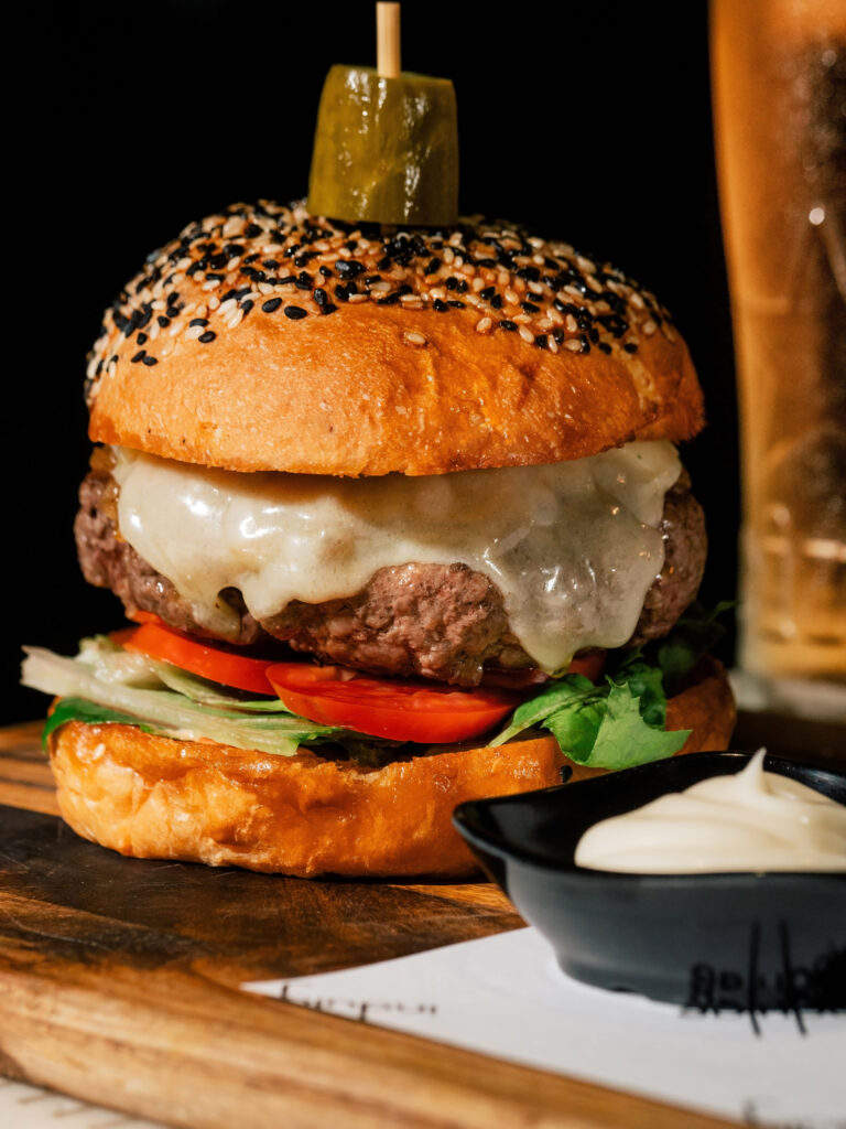 Wagyu Beef Burger with caramelized onion and Gruyere cheese
