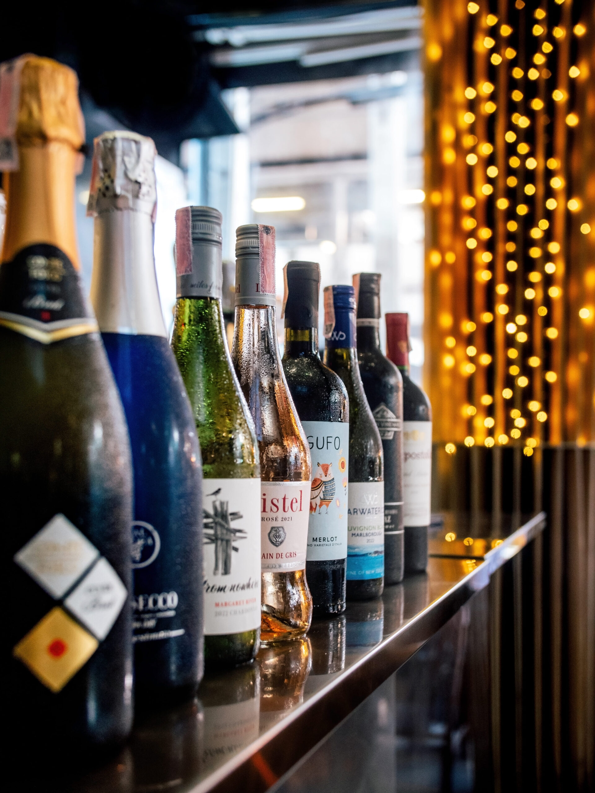 Cocktail and liquor bottles at Indulge Fusion Food & Cocktail Bar Bangkok