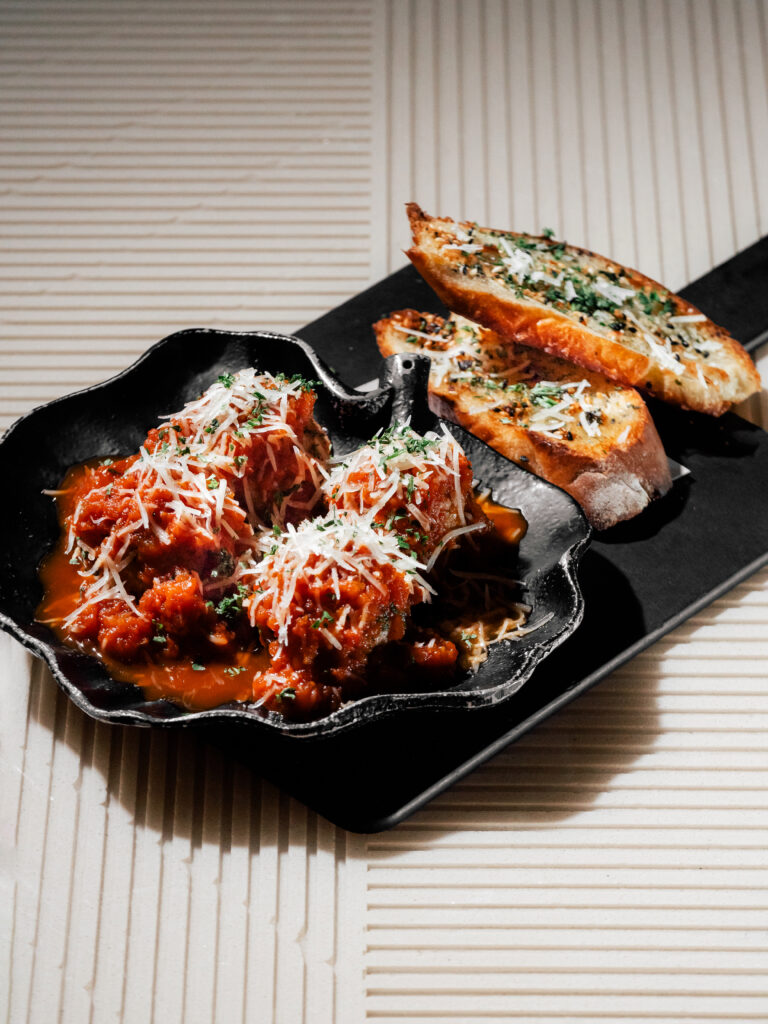 Pan Seared Pork Meat Balls with tomato and white wine gravy