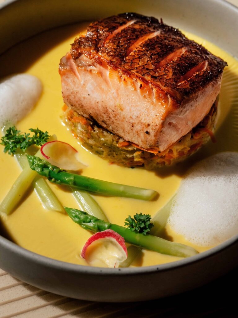 Safflower Salmon Fillet with vegetables, asparagus and safflower sauce