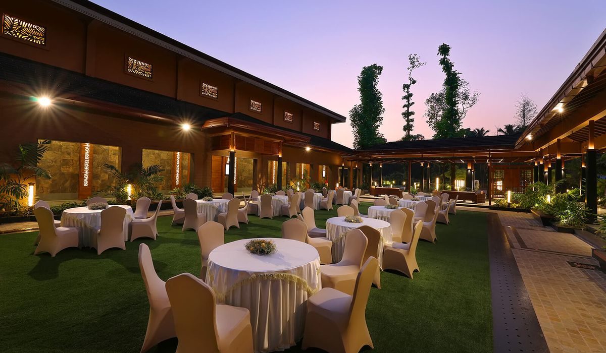 Guests enjoying a well-planned party at a restaurant with an elegant table setup