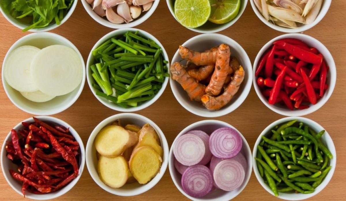 Thai food ingredients including herbs, spices, aromatics, and fresh produce